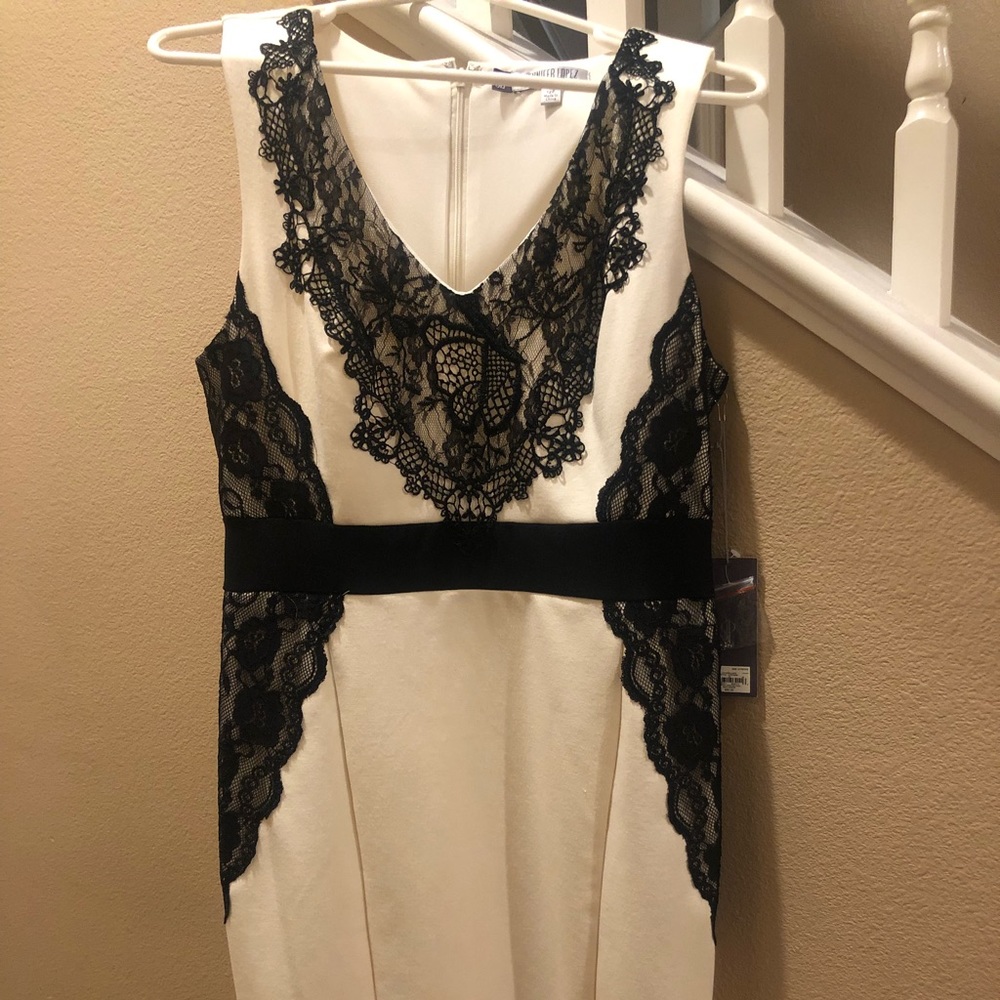 Jennifer Lopez cream and black cocktail dress